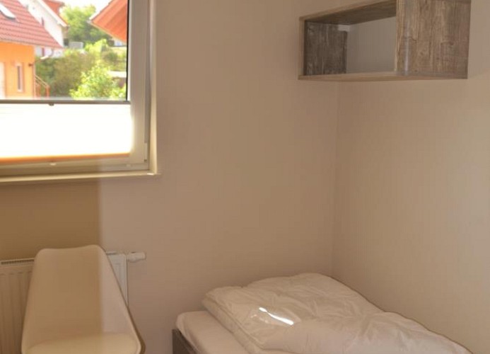 zweites Schlafzimmer mit Einzelbetten - ideal für die Kinder!