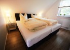 romantisches Doppelbettzimmer mit Boxspringbetten