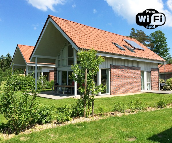 W 9 - Ferienhaus mit Terrasse, Kamin und Wallbox