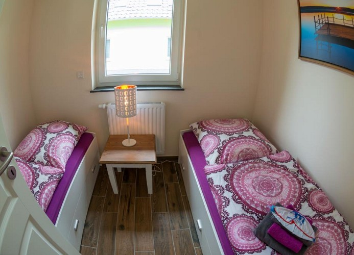 zweites Schlafzimmer mit Einzelbetten - ideal für die Kinder!